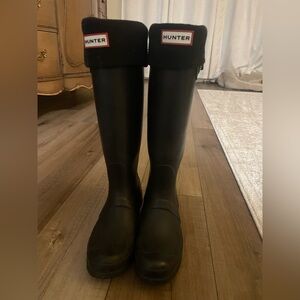 Hunter tall boots. Black. With tall Hunter socks. Women’s size 6.